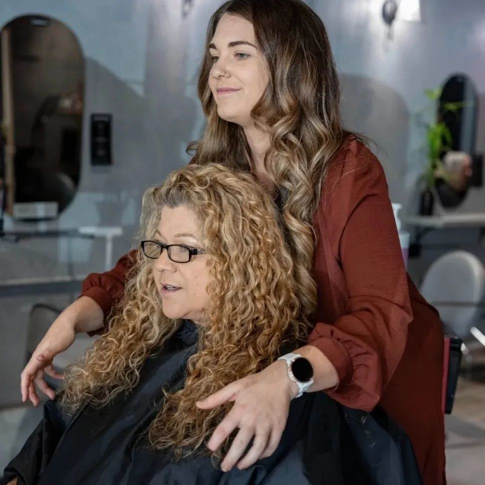 sunshine-curls-australia-Hairdresser with client